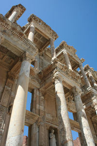 Low angle view of old temple against clear sky