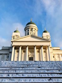 Low angle view of building against blue sky