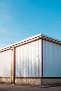 Metallic structure against blue sky