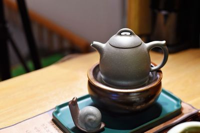 Close-up of tea cup on table