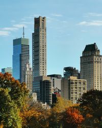 Buildings in city against sky