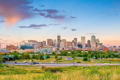 Cityscape against sky during sunset