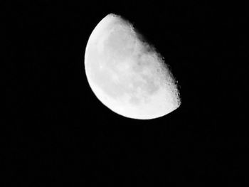 Low angle view of moon against sky at night