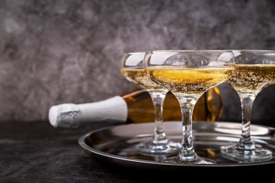 Close-up of wine in glass on table