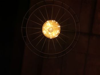 Low angle view of illuminated pendant light