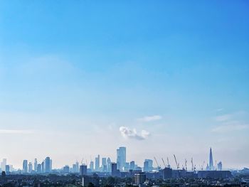 Modern buildings against blue sky