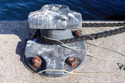 Different bollards and technical installations of vessel traffic at a port.