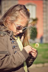 Portrait of woman wearing sunglasses