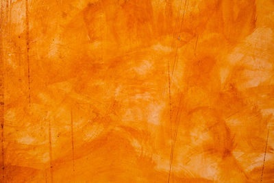 Full frame shot of orange painted wall