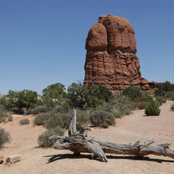 Rock formations in desert against clear sky