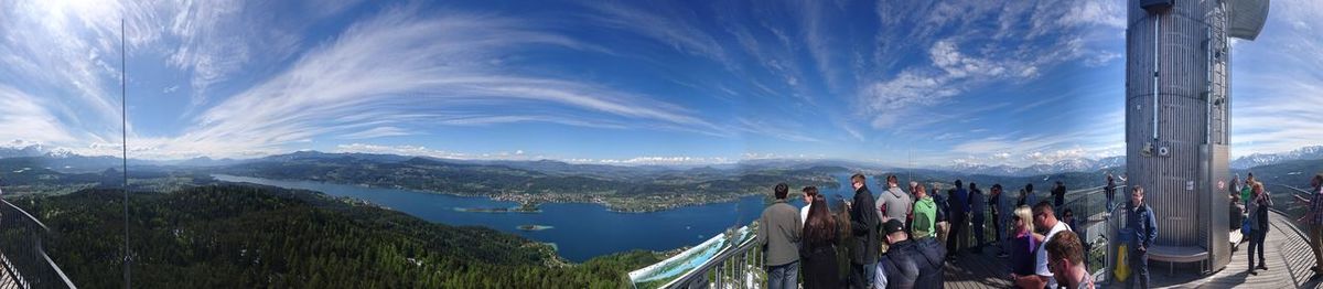 Panoramic view of mountains against cloudy sky