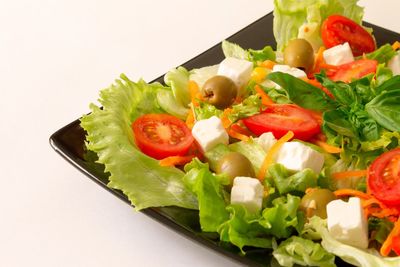 Close-up of chopped fruits in plate