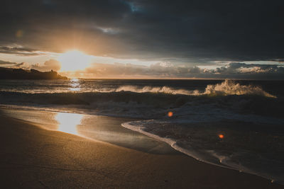 Scenic view of sea against sky during sunset