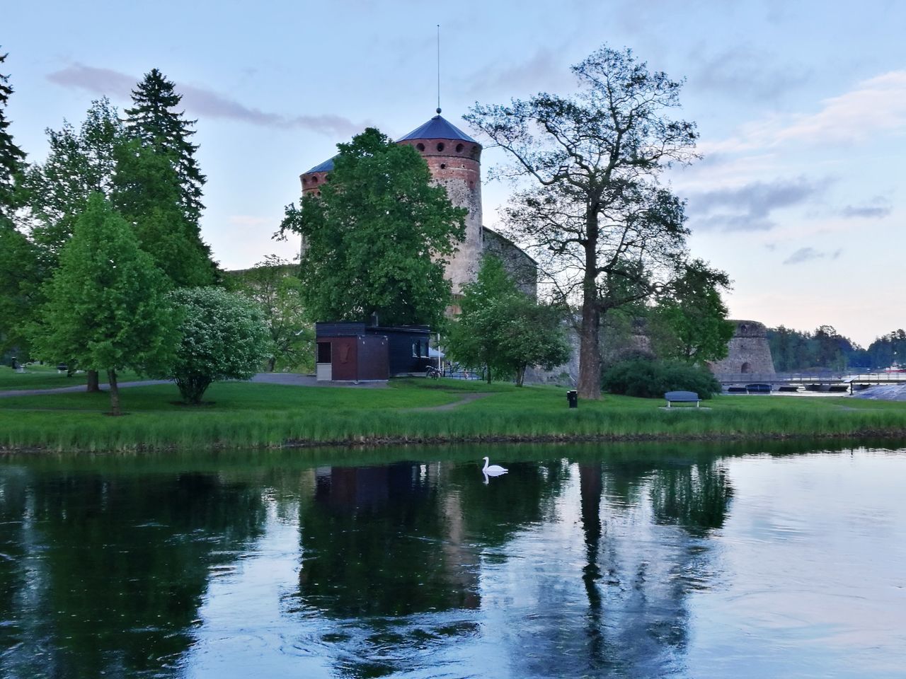 REFLECTION OF BUILDING IN WATER