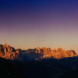 Scenic view of mountains against sky during sunset