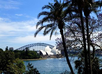 Scenic view of bridge over river against sky