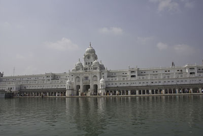 View of building against cloudy sky