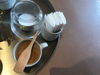 High angle view of tea in glass on table
