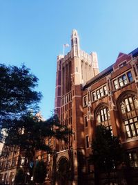 Low angle view of buildings against clear sky