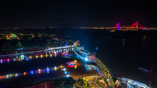 High angle view of illuminated city at night