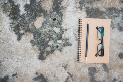 High angle view of books on paper