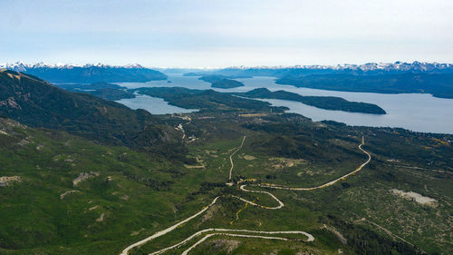 High angle view of road amidst mountains against sky