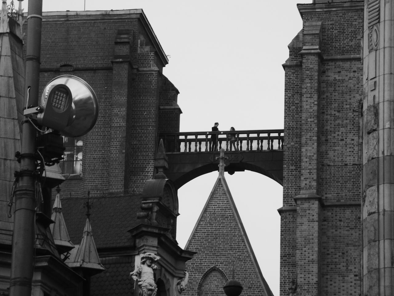 architecture, built structure, connection, history, building exterior, bridge - man made structure, outdoors, low angle view, day, no people, sky, city