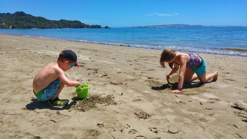 Boy playing on beach