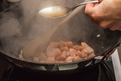 Midsection of person preparing food