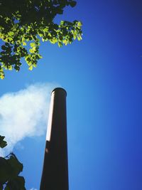 Low angle view of building against blue sky