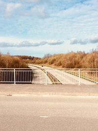 View of bridge over road against sky