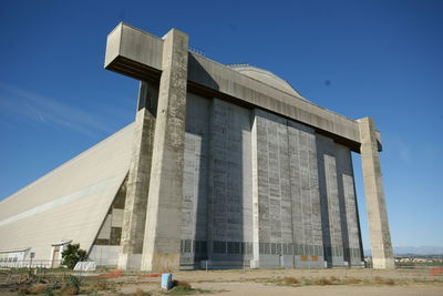 Low angle view of built structure against blue sky