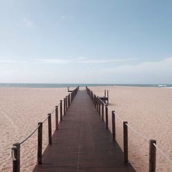 High angle view of pier over beach