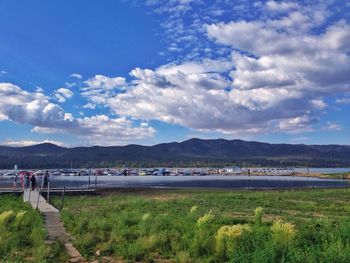 Scenic view of mountains against cloudy sky