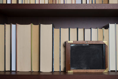 Close-up of books in shelf