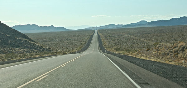 Country road passing through landscape