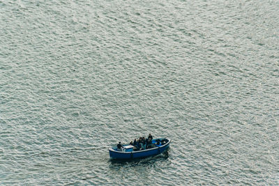 High angle view of boat sailing in sea