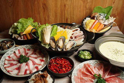 High angle view of various food on table