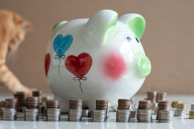 Close-up of coins on table