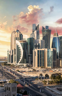 Modern buildings against sky in city