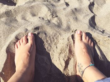 Low section of woman at beach