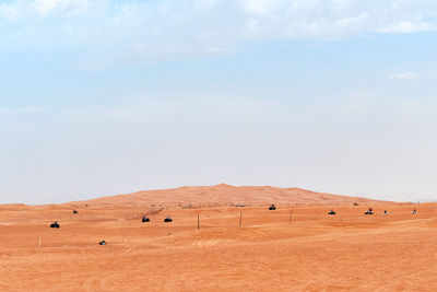 Scenic view of desert against sky