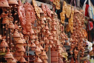 Close-up of clay handicrafts for sale at market stall