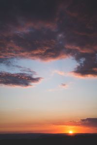 Scenic view of dramatic sky during sunset