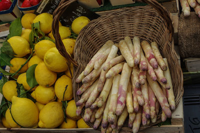 High angle view of fruits in basket for sale at market stall