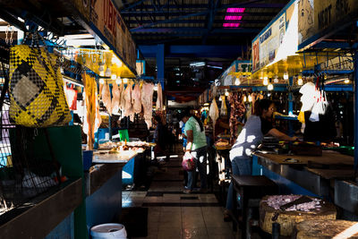 Meats hanging at butcher shop