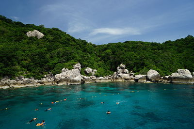 Scenic view of sea against blue sky