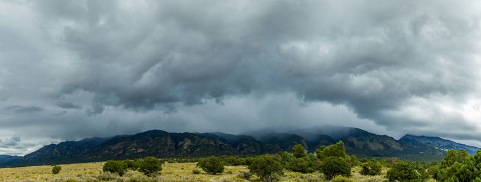 Scenic view of dramatic sky over landscape