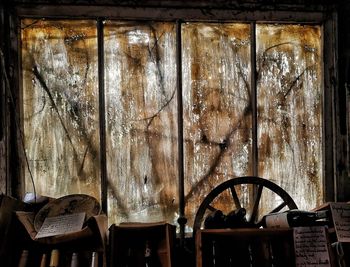 Empty chairs and table in abandoned room