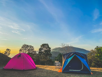 View of tent against cloudy sky